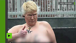 Une militante Femen en surpoids se déguise en Donald Trump devant l’ambassade des États-Unis à Kiev